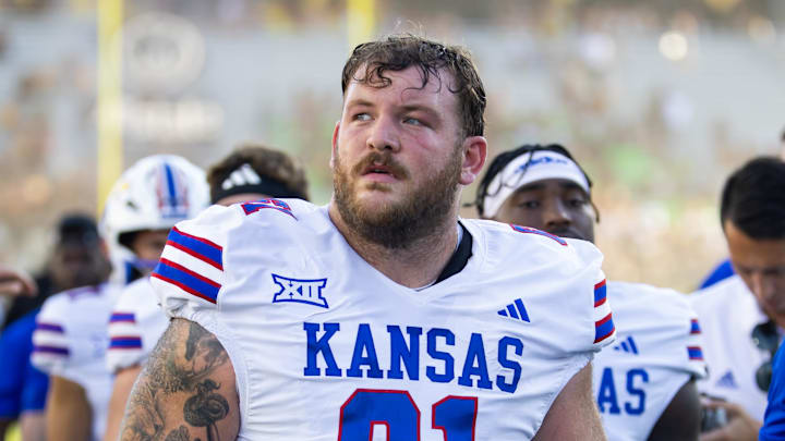 Oct 5, 2024; Tempe, Arizona, USA; Kansas Jayhawks offensive lineman Bryce Foster (61) against the Arizona State Sun Devils at Mountain America Stadium. Mandatory Credit: Mark J. Rebilas-Imagn Images