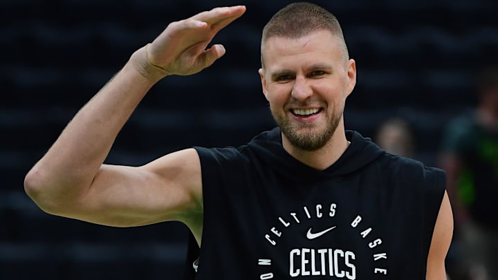 May 14, 2025; Boston, Massachusetts, USA; Boston Celtics center Kristaps Porzingis (8) reacts prior to game five of the second round for the 2025 NBA Playoffs against the New York Knicks at TD Garden. Mandatory Credit: Bob DeChiara-Imagn Images
