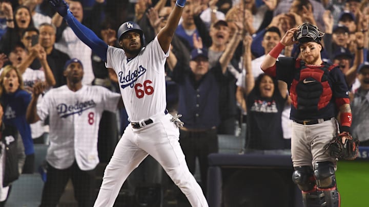 Oct 27, 2018; Los Angeles, CA, USA; Los Angeles Dodgers outfielder Yasiel Puig (66) celebrates after hitting a three-run home run against the Boston Red Sox in the sixth inning in game four of the 2018 World Series at Dodger Stadium. Mandatory Credit: Robert Hanashiro-Imagn Images