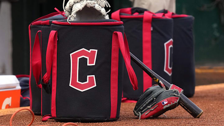 Mar 30, 2024; Oakland, California, USA; Cleveland Guardians equipment sits in front of the dugout before the game against the Oakland Athletics at Oakland-Alameda County Coliseum. Mandatory Credit: Darren Yamashita-Imagn Images