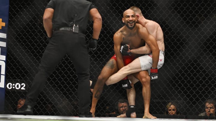 May 11, 2024; St. Louis, Missouri, USA; Charles Johnson (red gloves) fights Jake Hadley (blue gloves) during UFC Fight Night at Enterprise Center.