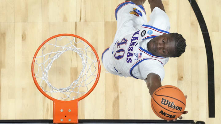 Louisville aimed high in landing top players Flory Bidunga (#40) and Jackson Shelstad in the transfer portal.