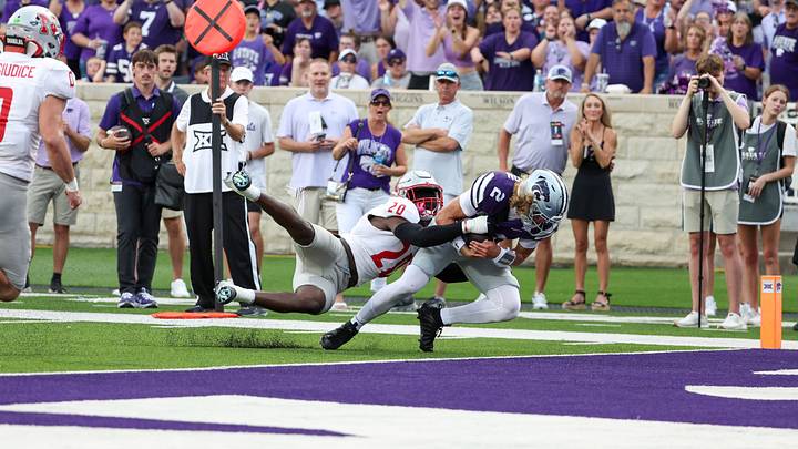 Sep 5, 2026; Manhattan, Kansas, USA; Nicholls State Colonels linebacker Kevin Martin Jr. (20) tries to keep Kansas State Wildcats quarterback Avery Johnson (2) out of them end zone during the first quarter at Bill Snyder Family Football Stadium. Johnson scored on the play. Mandatory Credit: Scott Sewell-Imagn Images Sep 5, 2026; Manhattan, Kansas, USA; Nicholls State Colonels linebacker Kevin Martin Jr. (20) tries to keep Kansas State Wildcats quarterback Avery Johnson (2) out of them end zone during the first quarter at Bill Snyder Family Football Stadium. Johnson scored on the play. Mandatory Credit: Scott Sewell-Imagn Images