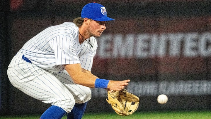 Iowa Cubs' Ben Cowles (8) fields a ground ball at Principal Park in Des Moines.