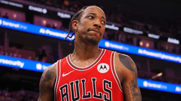 Mar 7, 2024; San Francisco, California, USA; Chicago Bulls forward DeMar DeRozan (11) scores a basket and is fouled by the Golden State Warriors during the fourth quarter at Chase Center. Mandatory Credit: Kelley L Cox-USA TODAY Sports