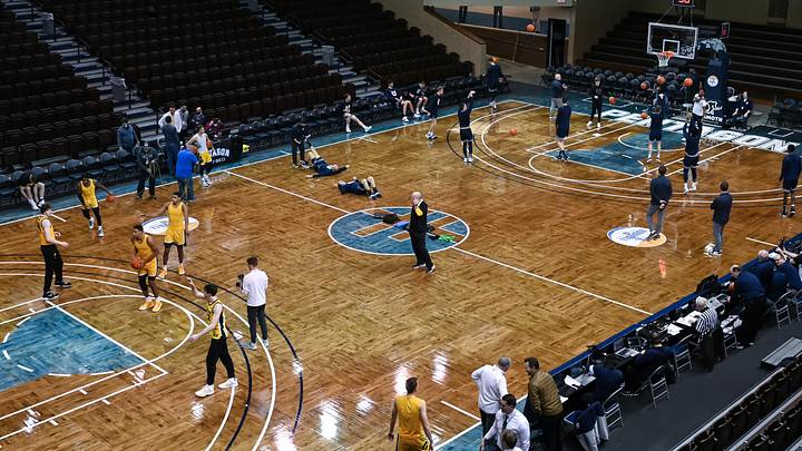 Dec 18, 2021; Sioux Falls, South Dakota, USA;  Players warm up before the game between the Iowa Hawkeyes and the Utah State Aggies at Sanford Pentagon. Mandatory Credit: Steven Branscombe-USA TODAY Sports