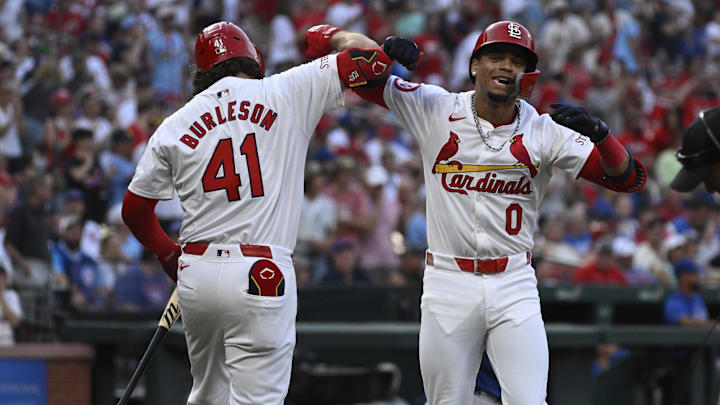 Jul 13, 2024; St. Louis, Missouri, USA; St. Louis Cardinals shortstop Masyn Winn (0) celebrates with first baseman Alec Burleson (41) after hitting a home run against the Chicago Cubs during the first inning at Busch Stadium. Mandatory Credit: Jeff Le-Imagn Images