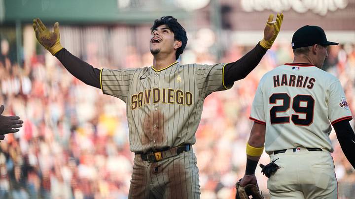 Sep 13, 2026; San Francisco, California, USA; San Diego Padres catcher Ethan Salas (8) reacts at third base after hitting a triple against San Francisco Giants starting pitcher Logan Webb (not pictured) during the fourth inning at Oracle Park. Mandatory Credit: Robert Edwards-Imagn Images Sep 13, 2026; San Francisco, California, USA; San Diego Padres catcher Ethan Salas (8) reacts at third base after hitting a triple against San Francisco Giants starting pitcher Logan Webb (not pictured) during the fourth inning at Oracle Park. Mandatory Credit: Robert Edwards-Imagn Images