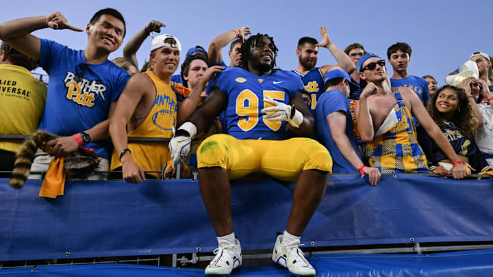 Sep 14, 2024; Pittsburgh, Pennsylvania, USA; Pittsburgh Panthers defensive lineman Francis Brewu (95) celebrates after defeating the West Virginia Mountaineers at Acrisure Stadium. Mandatory Credit: Barry Reeger-Image Images
