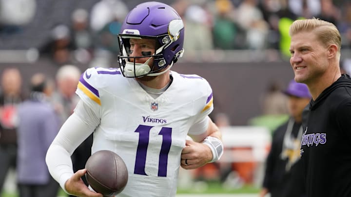 Oct 5, 2025; Tottenham, United Kingdom; Minnesota Vikings quarterback Carson Wentz (11) warms up before an NFL International Series game between the Minnesota Vikings and the Cleveland Browns at Tottenham Hotspur Stadium.