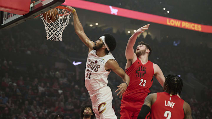 Feb 1, 2026; Portland, Oregon, USA; Cleveland Cavaliers center Jarrett Allen (31) dunks the basketball during the first half against Portland Trail Blazers center Donovan Clingan (23) at Moda Center. Mandatory Credit: Troy Wayrynen-Imagn Images