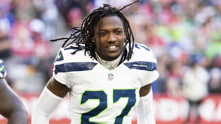 Dec 8, 2024; Glendale, Arizona, USA; Seattle Seahawks cornerback Riq Woolen (27) against the Arizona Cardinals at State Farm Stadium.