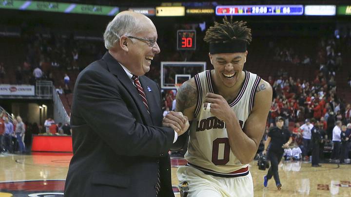 Matt Stone/The Courier-Journal
Damion Lee and U of L sports information director Kenny Klein share a laugh after the game.
Louisville's Damion Lee and Kenny Klein, UofL sports information director, share a laugh as the two walked off the court after the Cards beat Duke 71-64 Saturday afternoon at the KFC Yum! Center. Feb. 20, 2016