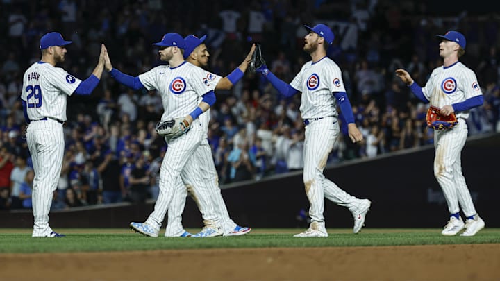 Sep 19, 2024; Chicago, Illinois, USA; Chicago Cubs players celebrate after defeating the Washington Nationals at Wrigley Field. Sep 19, 2024; Chicago, Illinois, USA; Chicago Cubs players celebrate after defeating the Washington Nationals at Wrigley Field.