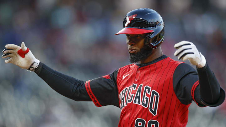 Chicago White Sox center fielder Luis Robert Jr. (88) celebrates after hitting an RBI single against the Texas Rangers at Rate Field. Chicago White Sox center fielder Luis Robert Jr. (88) celebrates after hitting an RBI single against the Texas Rangers at Rate Field.