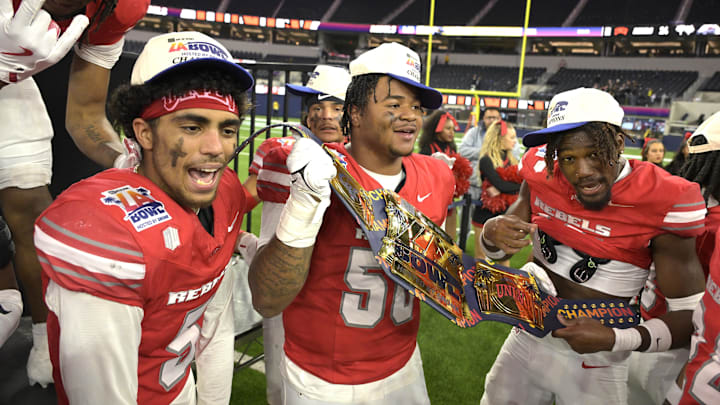 The UNLV Rebels celebrate after defeating the California Golden Bears in the LA Bowl at SoFi Stadium. The UNLV Rebels celebrate after defeating the California Golden Bears in the LA Bowl at SoFi Stadium.