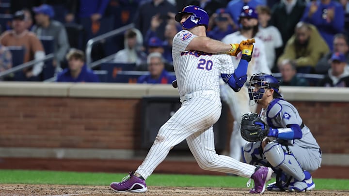 New York Mets first baseman Pete Alonso hits a single during Game 5 of a National League Championship Series against the Los Angeles Dodgers on Oct. 18 at Citi Field. New York Mets first baseman Pete Alonso hits a single during Game 5 of a National League Championship Series against the Los Angeles Dodgers on Oct. 18 at Citi Field.