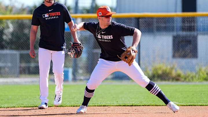 Detroit Tigers infielder Jace Jung, right, practices next to infielder Zach McKinstry during spring training at TigerTown in Lakeland, FL.