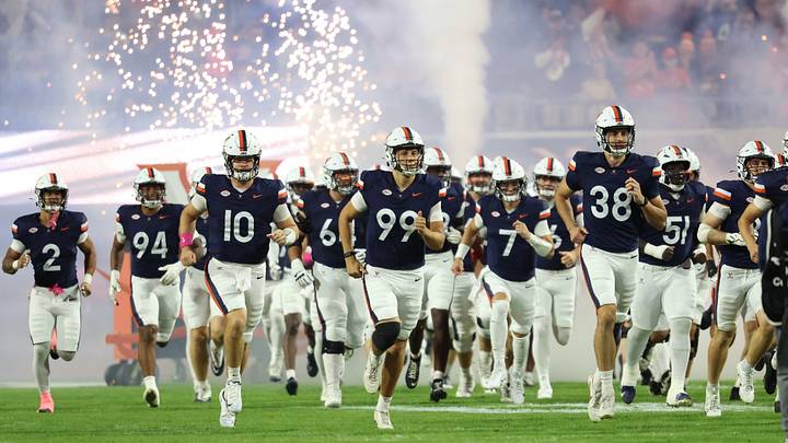 Oct 10, 2026; Charlottesville, Virginia, USA; Virginia Cavaliers players take to the field prior to their game against the Syracuse Orange at Scott Stadium. Mandatory Credit: Geoff Burke-Imagn Images Oct 10, 2026; Charlottesville, Virginia, USA; Virginia Cavaliers players take to the field prior to their game against the Syracuse Orange at Scott Stadium. Mandatory Credit: Geoff Burke-Imagn Images