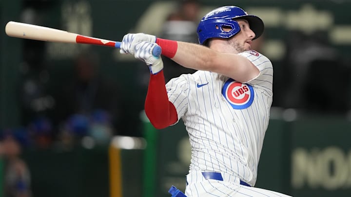 Mar 15, 2025; Bunkyo, Tokyo, Japan; Chicago Cubs right fielder Kyle Tucker (30) bats against the Hanshin Tigers during the seventh inning at Tokyo Dome.