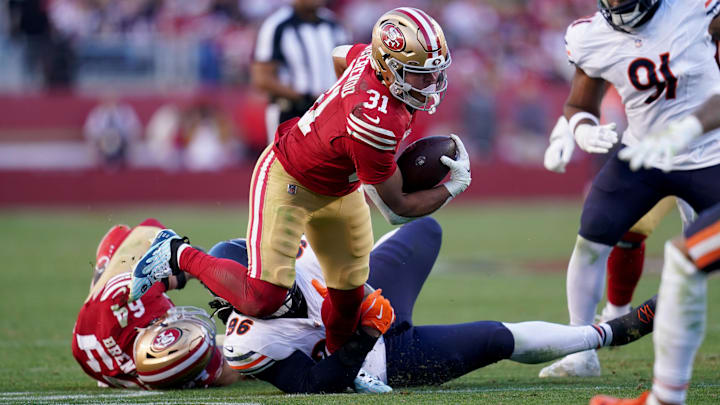 Dec 8, 2024; Santa Clara, California, USA; San Francisco 49ers running back Isaac Guerendo (31) runs the ball against the Chicago Bears in the third quarter at Levi's Stadium. Mandatory Credit: Cary Edmondson-Imagn Images Dec 8, 2024; Santa Clara, California, USA; San Francisco 49ers running back Isaac Guerendo (31) runs the ball against the Chicago Bears in the third quarter at Levi's Stadium. Mandatory Credit: Cary Edmondson-Imagn Images