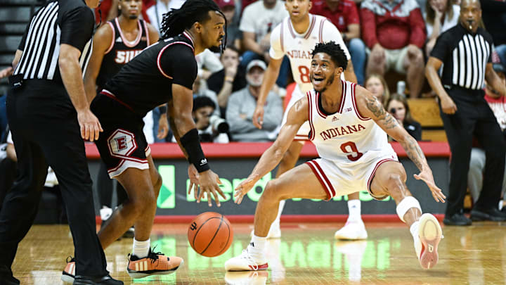 Indiana Hoosiers guard Kanaan Carlyle (9) defends against SIU Edwardsville Cougars guard Ray'Sean Taylor (3) during the first half at Simon Skjodt Assembly Hall. Indiana Hoosiers guard Kanaan Carlyle (9) defends against SIU Edwardsville Cougars guard Ray'Sean Taylor (3) during the first half at Simon Skjodt Assembly Hall.