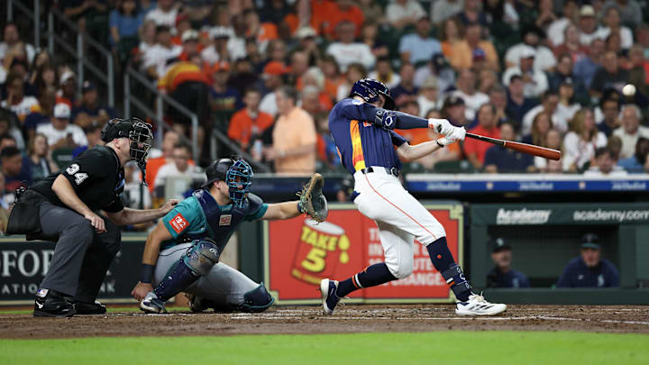 Sep 21, 2025; Houston, Texas, USA; Houston Astros center fielder Zachary Cole (16) hits a home run against the Seattle Mariners in the third inning at Daikin Park.