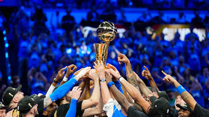 Jun 22, 2025; Oklahoma City, Oklahoma, USA; The Oklahoma City Thunder lift the Larry O'Brien Championship Trophy as they celebrate after winning game seven of the 2025 NBA Finals against the Indiana Pacers at Paycom Center. Mandatory Credit: Kyle Terada-Imagn Images