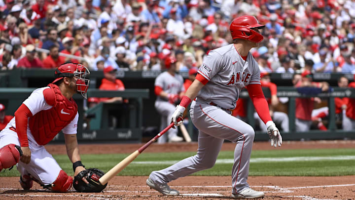 May 4, 2023; St. Louis, Missouri, USA; Los Angeles Angels first baseman Jake Lamb (18) hits a one run single against the St. Louis Cardinals during the third inning at Busch Stadium. Mandatory Credit: Jeff Curry-Imagn Images May 4, 2023; St. Louis, Missouri, USA; Los Angeles Angels first baseman Jake Lamb (18) hits a one run single against the St. Louis Cardinals during the third inning at Busch Stadium. Mandatory Credit: Jeff Curry-Imagn Images