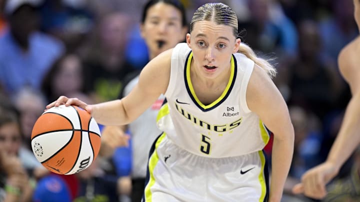 Dallas Wings guard Paige Bueckers (5) looks to move the ball to the basket against the New York Liberty during the first half at College Park Center.