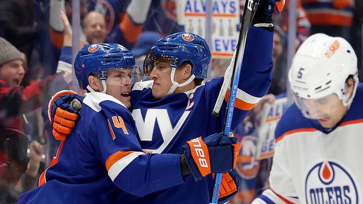 Dec 19, 2023; Elmont, New York, USA; New York Islanders left wing Anders Lee (27) celebrates his power play goal against the Edmonton Oilers with center Bo Horvat (14) during the second period at UBS Arena. Mandatory Credit: Brad Penner-USA TODAY Sports
