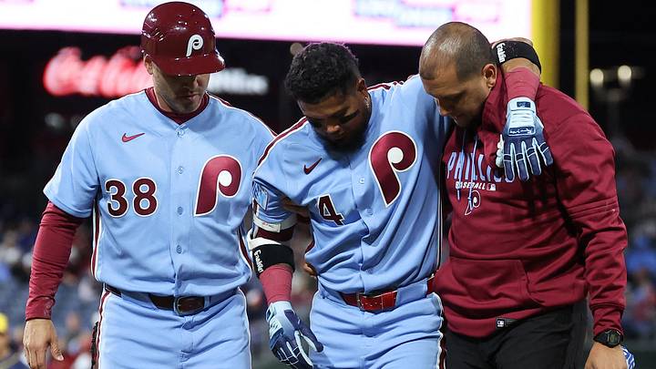Sep 24, 2026; Philadelphia, Pennsylvania, USA; Philadelphia Phillies second baseman Luis Arraez (4) is helped off the field by trainer Christian Bermudez and first base coach Paco Figueroa (38) after being injured during the sixth inning against the Milwaukee Brewers at Citizens Bank Park. Mandatory Credit: Bill Streicher-Imagn Images Sep 24, 2026; Philadelphia, Pennsylvania, USA; Philadelphia Phillies second baseman Luis Arraez (4) is helped off the field by trainer Christian Bermudez and first base coach Paco Figueroa (38) after being injured during the sixth inning against the Milwaukee Brewers at Citizens Bank Park. Mandatory Credit: Bill Streicher-Imagn Images