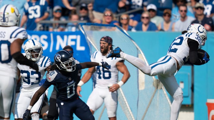 Indianapolis Colts safety Julian Blackmon (32) intercepts a pass intended for Tennessee Titans wide receiver Calvin Ridley (0) in the fourth quarter of their game at Nissan Stadium in Nashville, Tenn., Monday, Oct. 14, 2024.