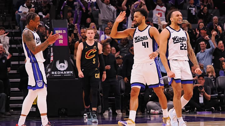 Mar 19, 2025; Sacramento, California, USA; Sacramento Kings players celebrate after a play against the Cleveland Cavaliers during the third quarter at Golden 1 Center. Mandatory Credit: Kelley L Cox-Imagn Images