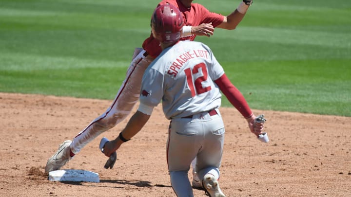 Apr 14, 2024; Tuscaloosa, AL, USA; Alabama infielderJustin Lebron (1) takes a throw at second to