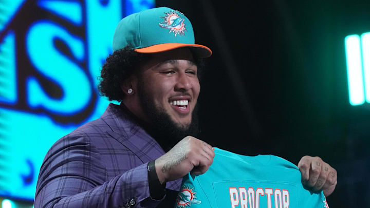 Apr 23, 2026; Pittsburgh, PA, USA; Alabama Crimson Tide tackle Kadyn Proctor is selected by the Miami Dolphins as the number twelve pick during the 2026 NFL Draft at Acrisure Stadium. Mandatory Credit: Kirby Lee-Imagn Images