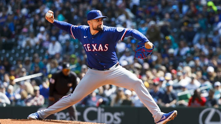 Apr 13, 2025; Seattle, Washington, USA; Texas Rangers starting pitcher Nathan Eovaldi (17) throws against the Seattle Mariners during the first inning at T-Mobile Park. Apr 13, 2025; Seattle, Washington, USA; Texas Rangers starting pitcher Nathan Eovaldi (17) throws against the Seattle Mariners during the first inning at T-Mobile Park.