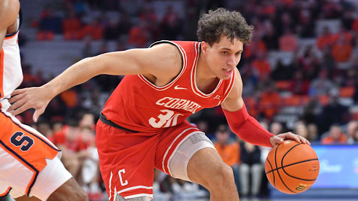Dec 5, 2023; Syracuse, New York, USA; Cornell Big Red guard Chris Manon (30) handles the ball against Syracuse. 