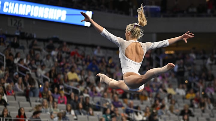 LSU Tigers gymnast Livvy Dunne warms up on floor before the start of the 2024 Women's National Gymnastics Championship.