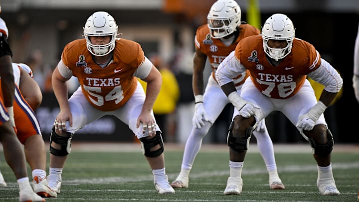 Dec 21, 2024; Austin, Texas, USA; Texas Longhorns offensive lineman Cole Hutson (54) and offensive lineman Kelvin Banks Jr. (78) in action during the game between the Texas Longhorns and the Clemson Tigers in the CFP National Playoff First Round at Darrell K Royal-Texas Memorial Stadium. Mandatory Credit: Jerome Miron-Imagn Images