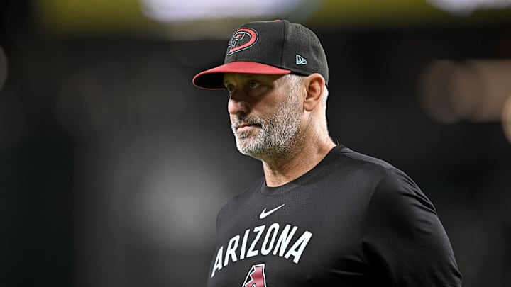 Aug 11, 2025; Arlington, Texas, USA; Arizona Diamondbacks manager Torey Lovullo (17) walks back to the dugout during the sixth inning against the Texas Rangers at Globe Life Field. Mandatory Credit: Jerome Miron-Imagn Images