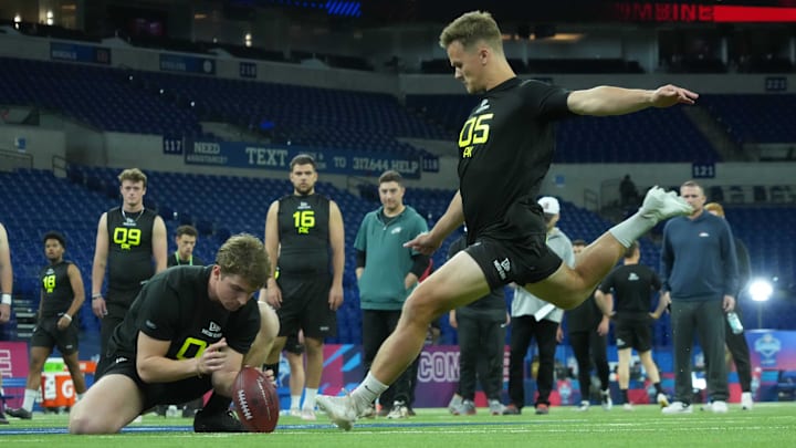 Feb 26, 2025; Indianapolis, IN, USA; Arizona place kicker Tyler Loop (PK05) attempts a field goal during workouts at the 2025 NFL Scouting Combine at Lucas Oil Stadium. Mandatory Credit: Kirby Lee-Imagn Images