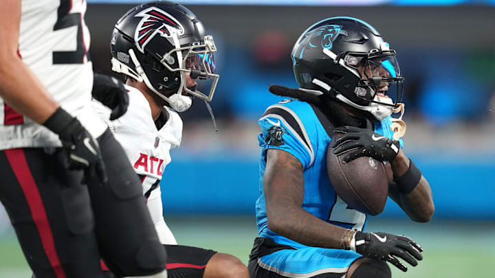 CHARLOTTE, NORTH CAROLINA - OCTOBER 13: Diontae Johnson #5 of the Carolina Panthers reacts after a first down catch against the Atlanta Falcons during the fourth quarter at Bank of America Stadium on October 13, 2024 in Charlotte, North Carolina. CHARLOTTE, NORTH CAROLINA - OCTOBER 13: Diontae Johnson #5 of the Carolina Panthers reacts after a first down catch against the Atlanta Falcons during the fourth quarter at Bank of America Stadium on October 13, 2024 in Charlotte, North Carolina.