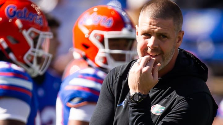 Florida Gators head coach Billy Napier watche this team warm up during the first half at Ben Hill Griffin Stadium in Gainesville, FL on Saturday, November 23, 2024. [Doug Engle/Gainesville Sun]