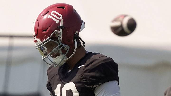 Aug. 6, 2026; Tuscaloosa, AL, USA; Quarterback Austin Mack walks to another throwing position during the Alabama Crimson Tide’s first open practice session. Aug. 6, 2026; Tuscaloosa, AL, USA; Quarterback Austin Mack walks to another throwing position during the Alabama Crimson Tide’s first open practice session.