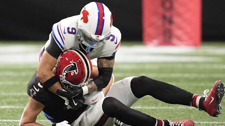 Oct 13, 2025; Atlanta, Georgia, USA; Atlanta Falcons wide receiver Drake London (5) is tackled by Buffalo Bills safety Taylor Rapp (9) after a catch