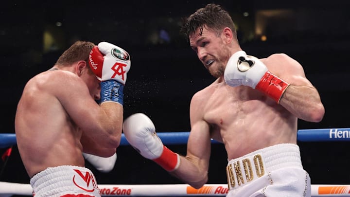 Canelo Alvarez (red trunks) and Callum Smith (white trunks) during their WBA, WBC and Ring Magazine super middleweight championship bout at the Alamodome in San Antonio, TX. 