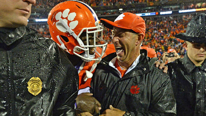 Clemson head coach Dabo Swinney celebrates with defensive tackle Kevin Dodd (98) after the Tigers 24-22 win over Notre Dame Saturday, October 3, 2015 at Clemson's Memorial Stadium. 

Football 2015 Clemson Notre Dame
