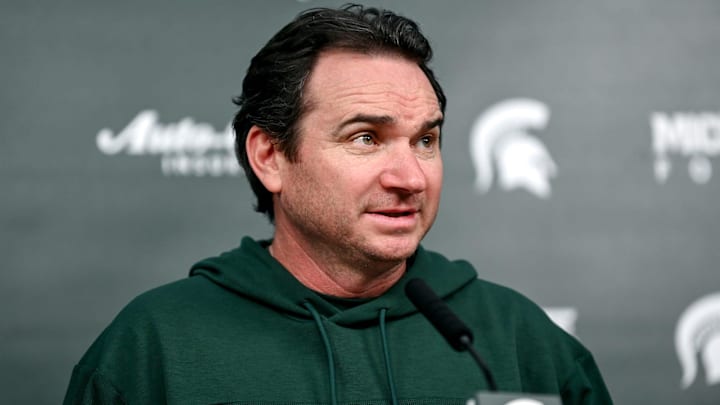 Michigan State coach Jonathan Smith talks the media on the first national signing day for college