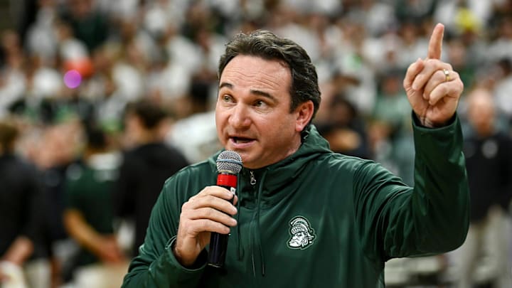 Michigan State's new football coach Jonathan Smith speaks to the crowd during a timeout in the basketball game against Georgia Southern on Tuesday, Nov. 28, 2023, at the Breslin Center in East Lansing.